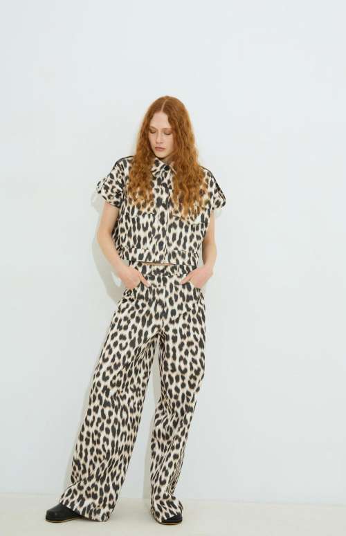 CLEA LEOPARD PRINT DENIM TROUSERS